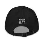 Black dad hat with 'Wear the Way' text on a white background