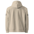Beige hoodie with text on sleeves against a white background