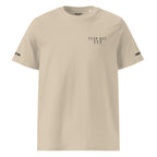 Beige t-shirt with text and logos on a white background