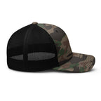 Black and camouflage trucker hat on a white background