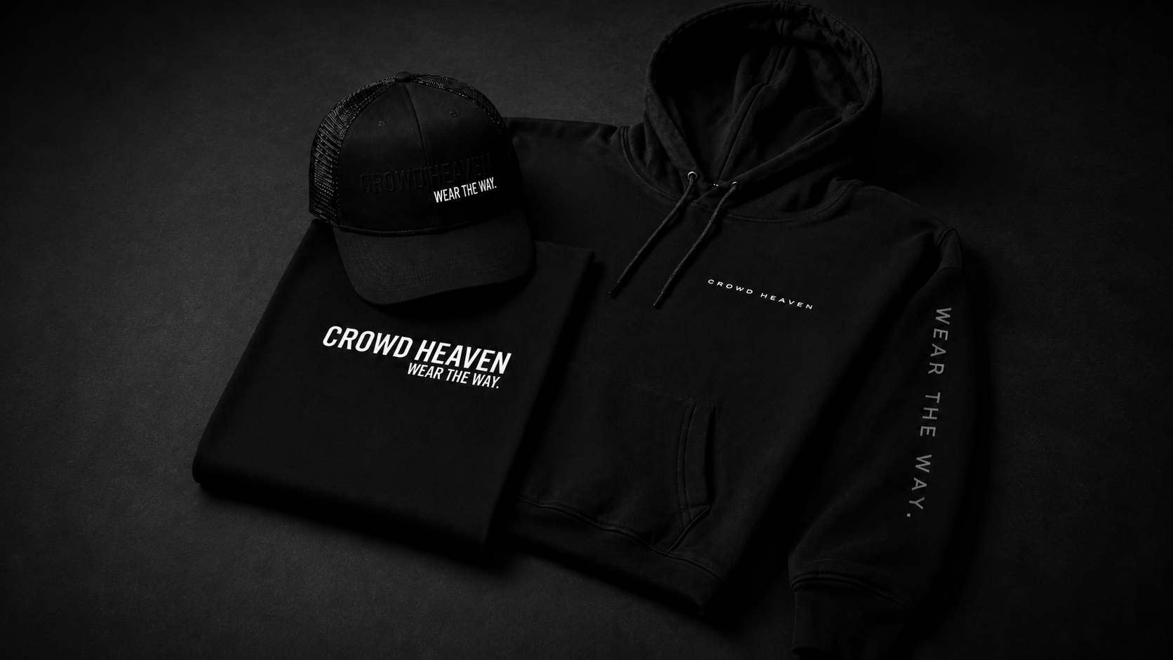 Crowd Heaven Signature Bundle with black hoodie, folded shirt, and headwear